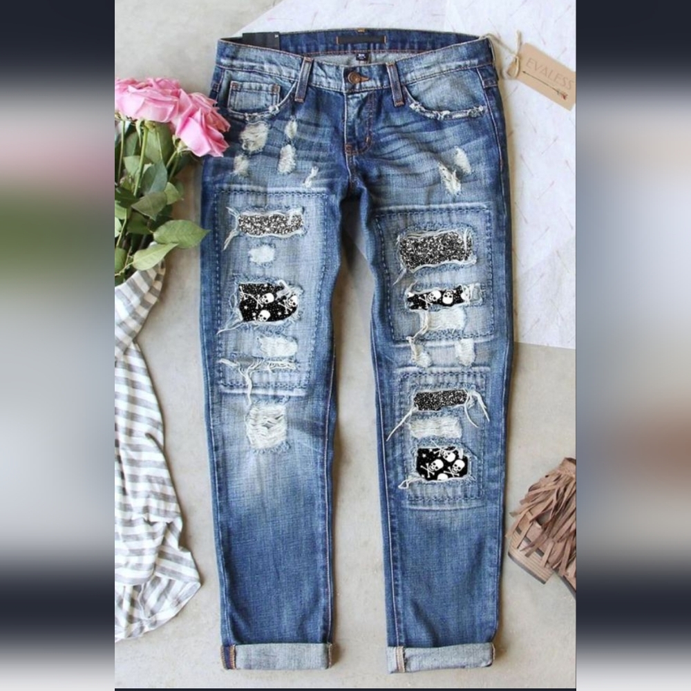 Sky blue acid wash distressed skull jeans